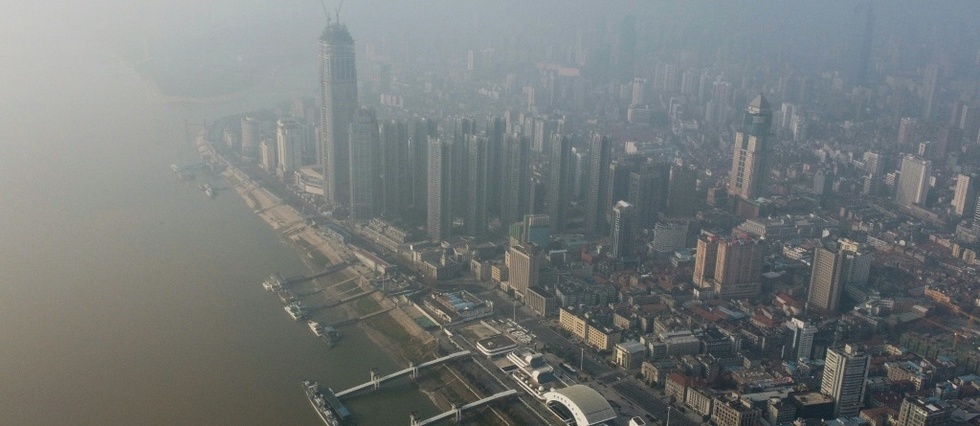 Transports suspendus, vacances prolongées: la Chine sous cloche face au virus